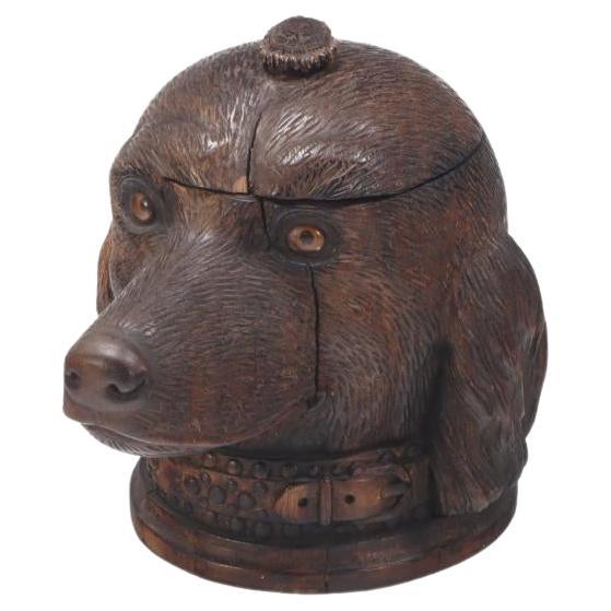 A whimsical antique Black Forest hand carved wood figural tobacco humidor box. 
