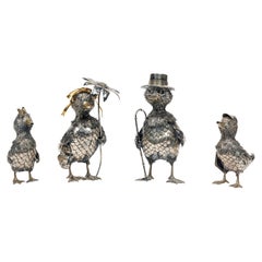 A Whimsical Buccellati Sterling Silver Family of Four Ducks