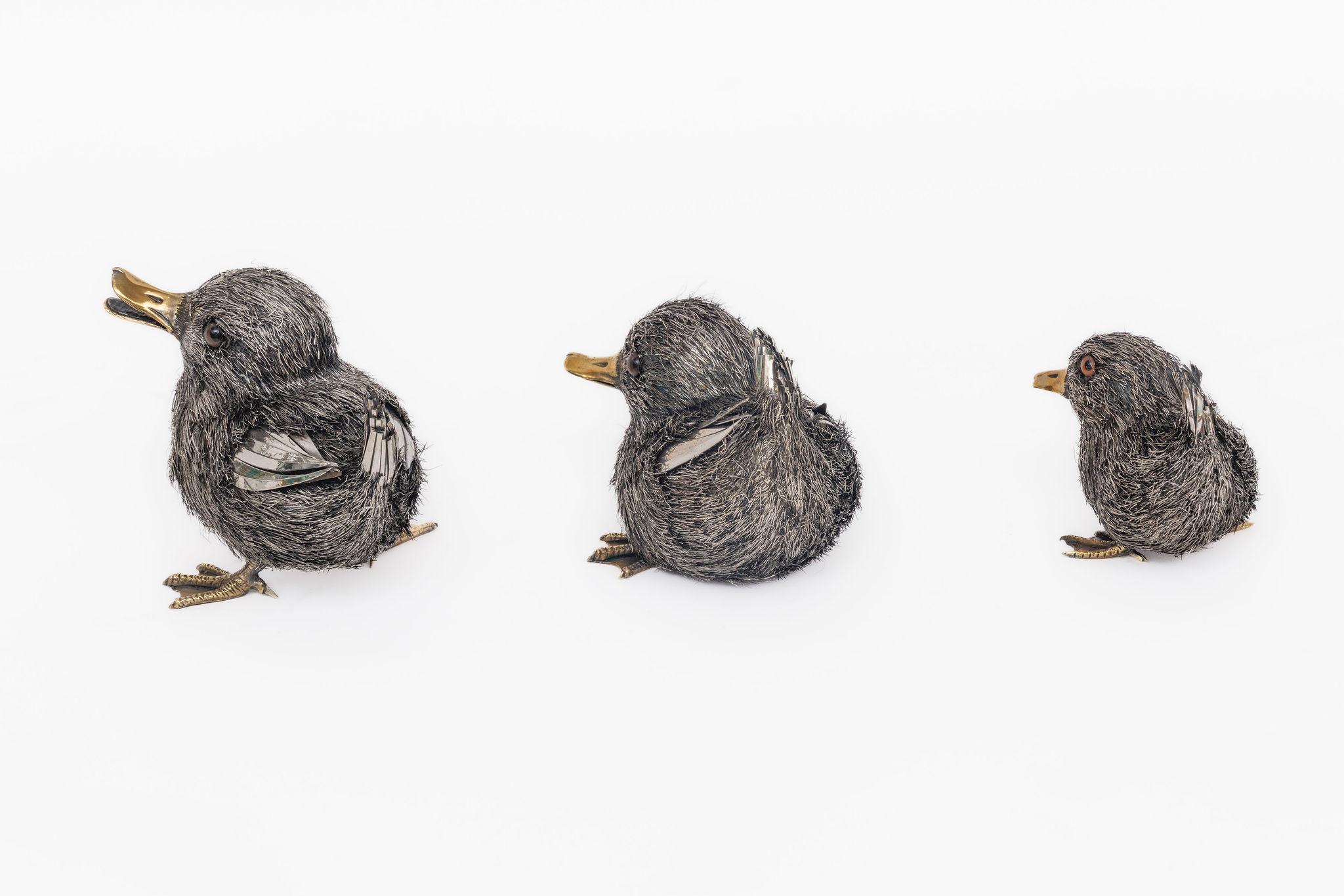 A Whimsical Family of Three Buccellati Sterling Silver Ducks

A delightful and finely crafted set of three sterling silver “furry” ducks by Buccellati, Italy. Each naturalistically modeled and intricately hand-chased to create the lifelike texture