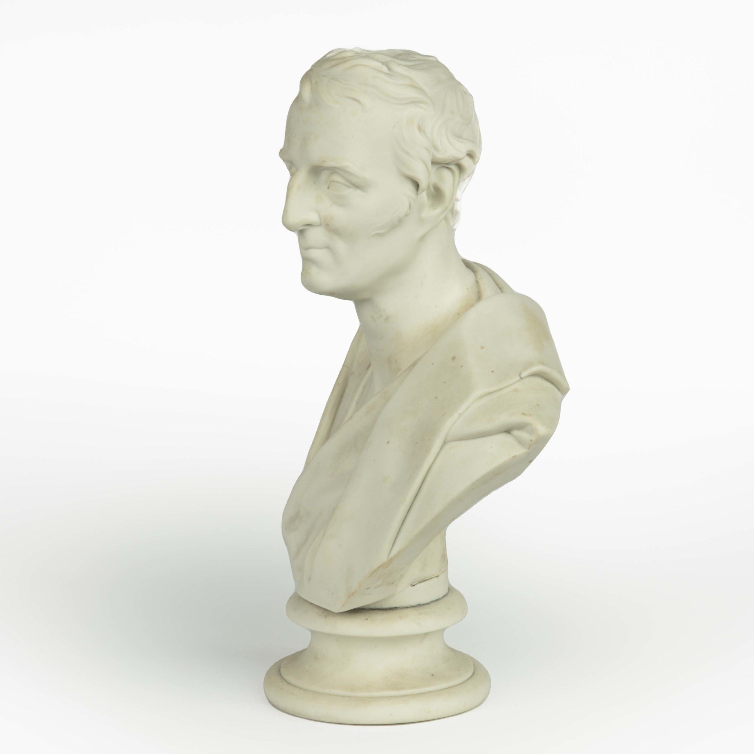 A white Parianware bust of the Duke of Wellington by E W Wyon, the Duke is shown in classical draperies looking slightly to the left, the reverse impressed ‘E.W. Wyon & F,.  English, 1853.

It seems that it was produced in 1853 as a posthumous