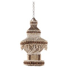 A White Cowrie Shell Hanging Light, Papau New Guinea