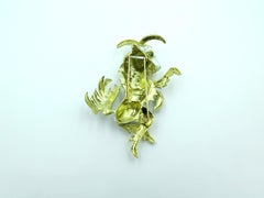 White Enamel, Emerald and Gold Ram Brooch