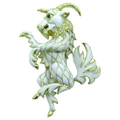 White Enamel, Emerald and Gold Ram Brooch