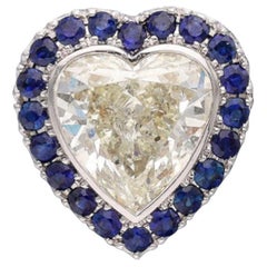A White Gold Diamond and Sapphire Heart Pendant 