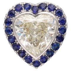 A White Gold Diamond and Sapphire Heart Pendant