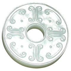 Antique A White Jade Archaistic 'Chilong' Disc  清白玉雕螭龍紋璧