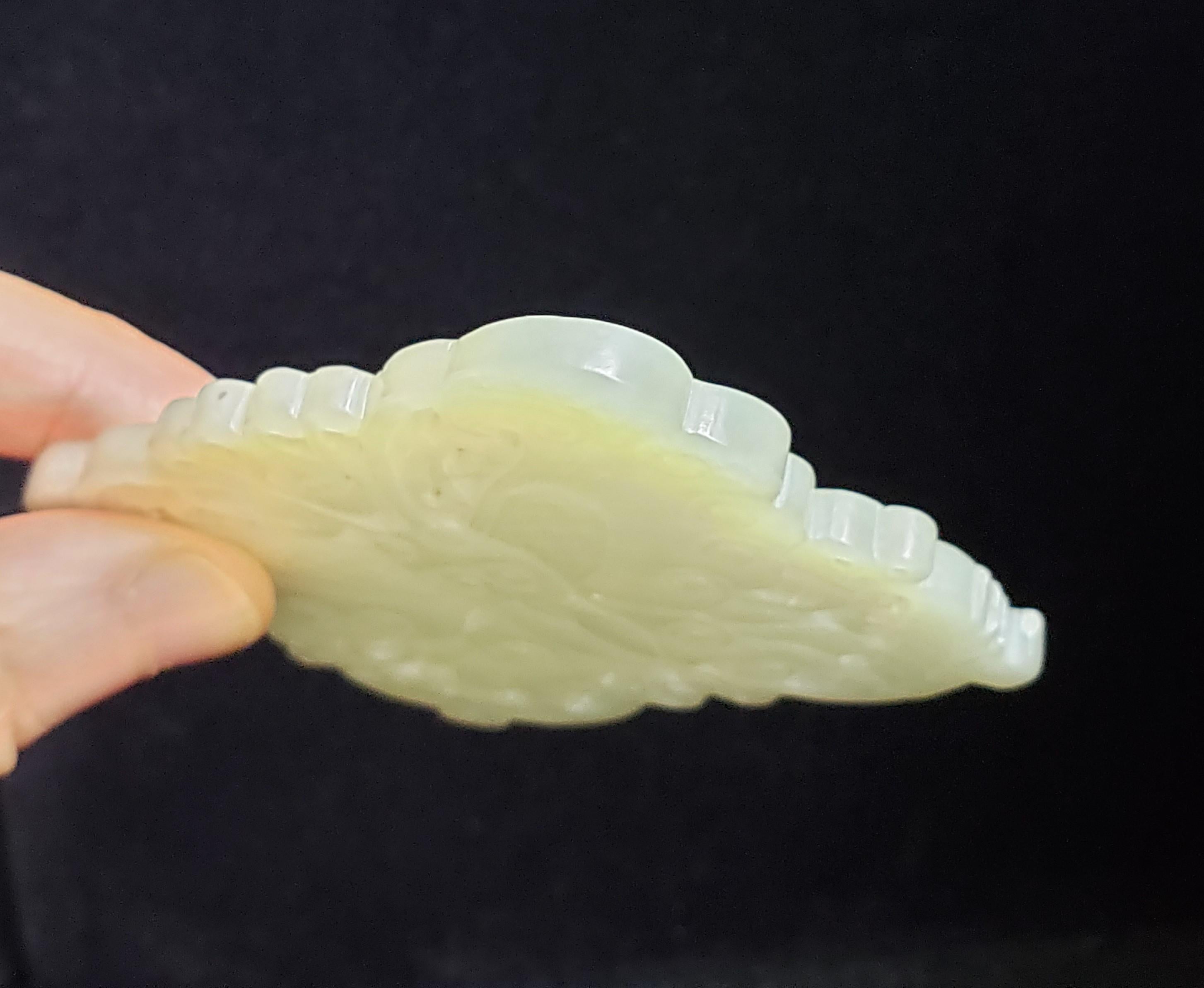 A White Jade Butterfly Plate, Ming Dynasty 8