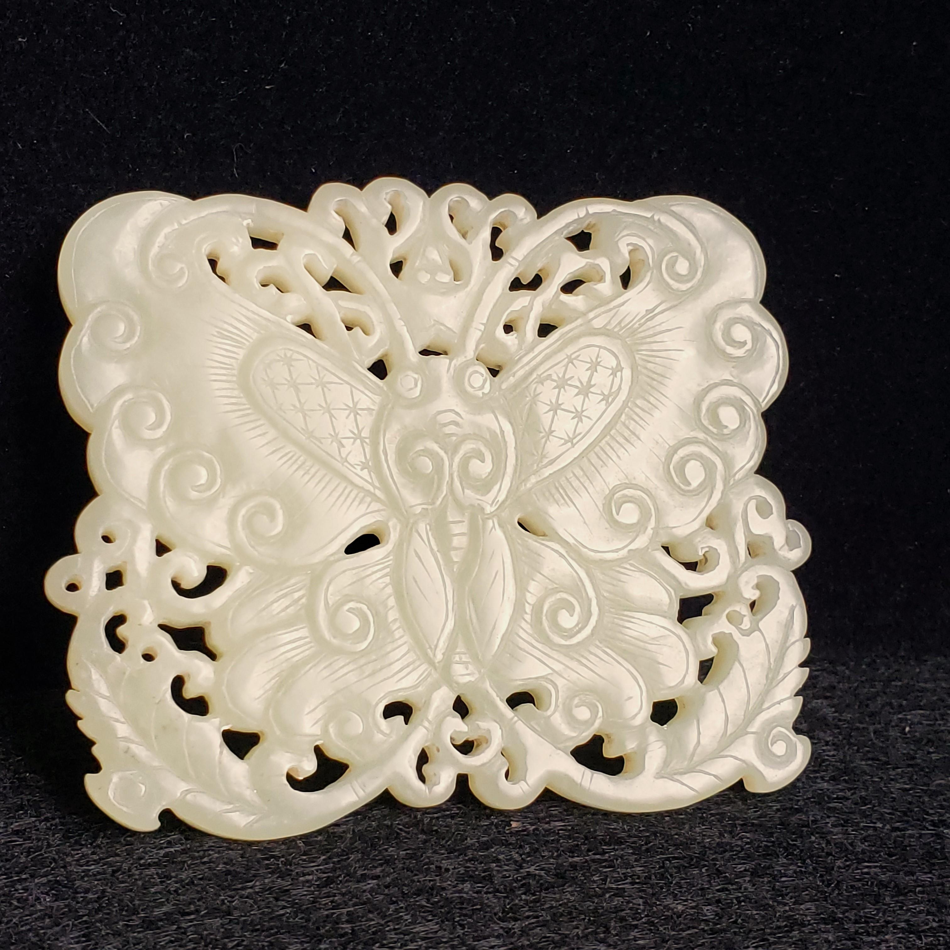 A White Jade Butterfly Plate, Ming Dynasty 9