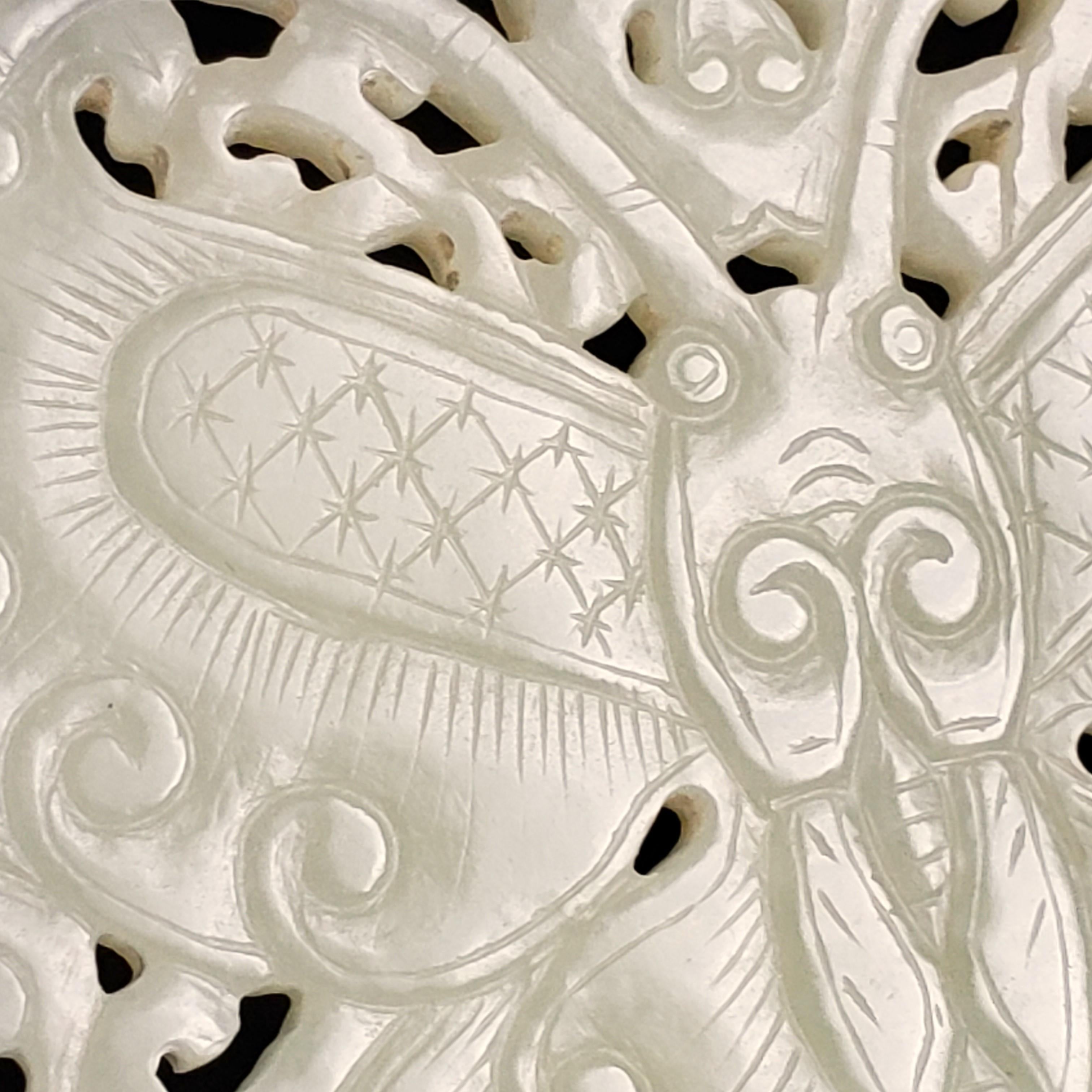 A White Jade Butterfly Plate, Ming Dynasty 12