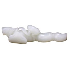 A White Jade Lotus Root Brush Rest, Qing Dynasty 