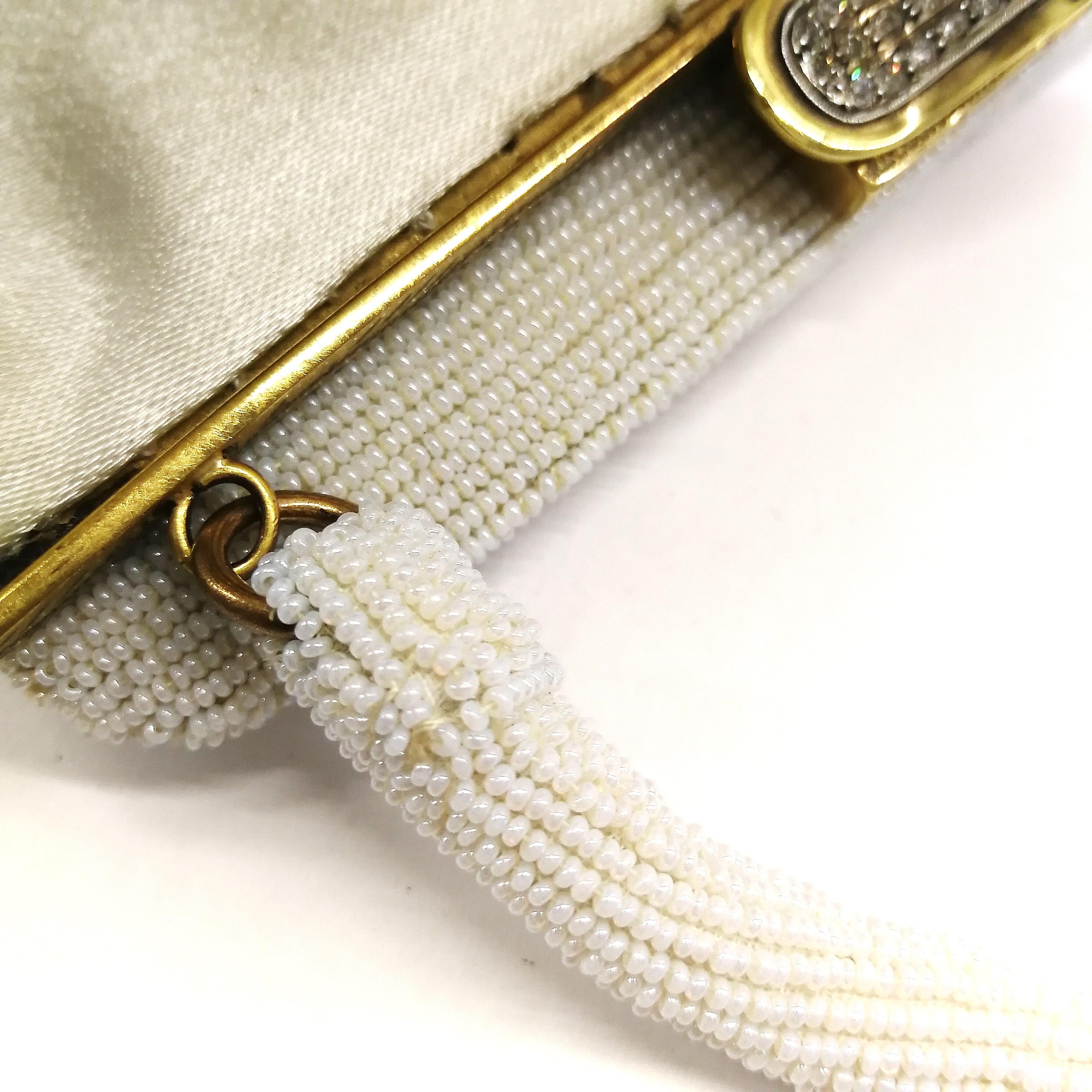 A white micro beaded evening bag, for Saks Fifth Avenue, France, 1950s. For Sale 5