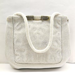 A white micro beaded evening bag, for Saks Fifth Avenue, France, 1950s.