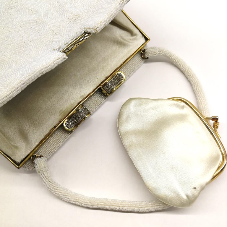 A white micro beaded evening bag, for Saks Fifth Avenue, France