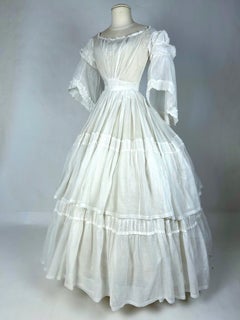 A white muslin Summer dress with a round crinoline - France, circa 1845-1855