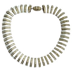 A white opaque glass and clear channel set paste collar/necklace, France, 1930s.