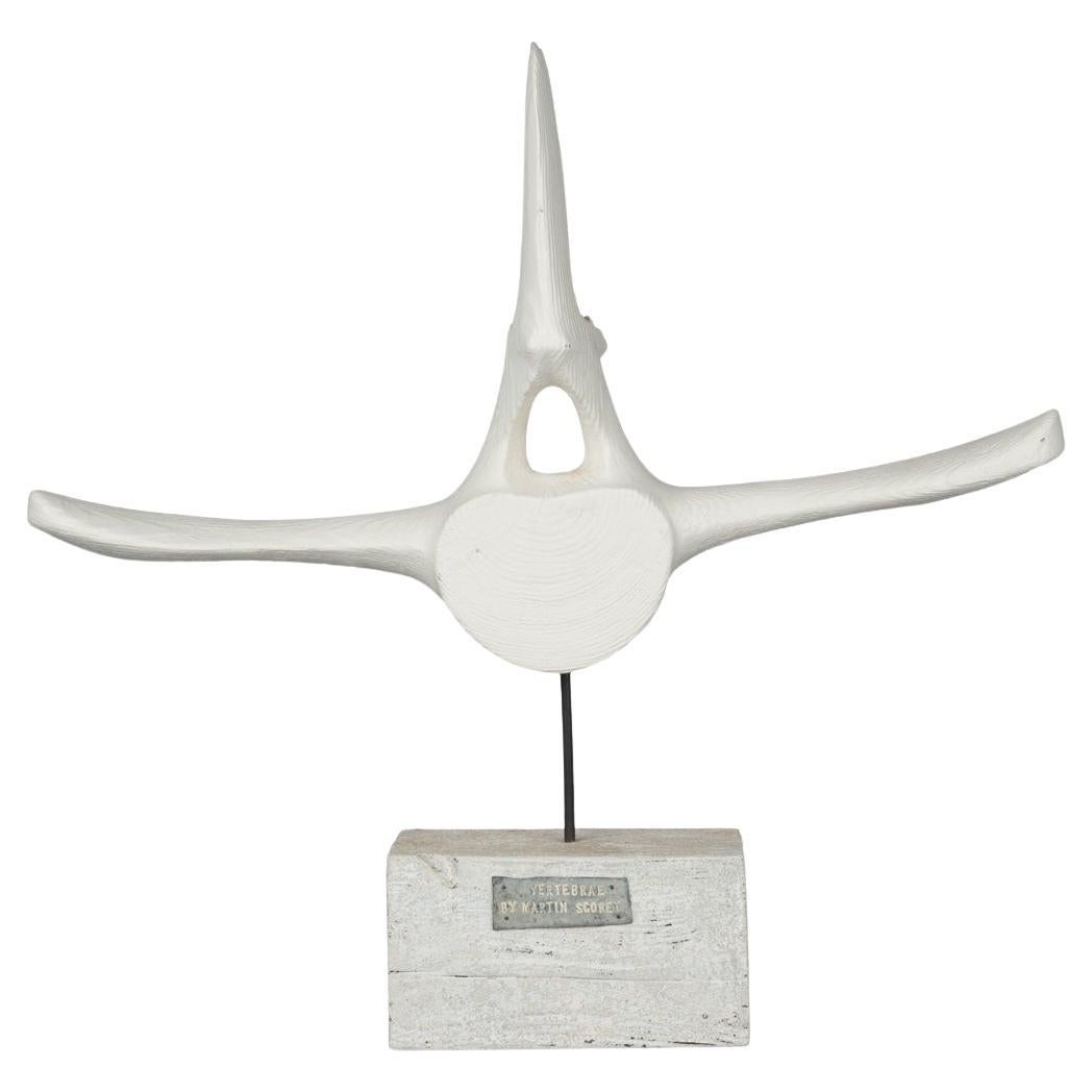 A white painted driftwood whale vertebra by Martin Scorey