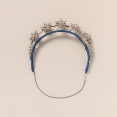 A White Paste and Metal Starburst Tiara