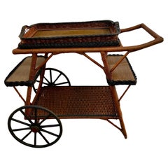 A Wicker Tea / Bar Cart With Removable Serving Tray with Bar Top Finish