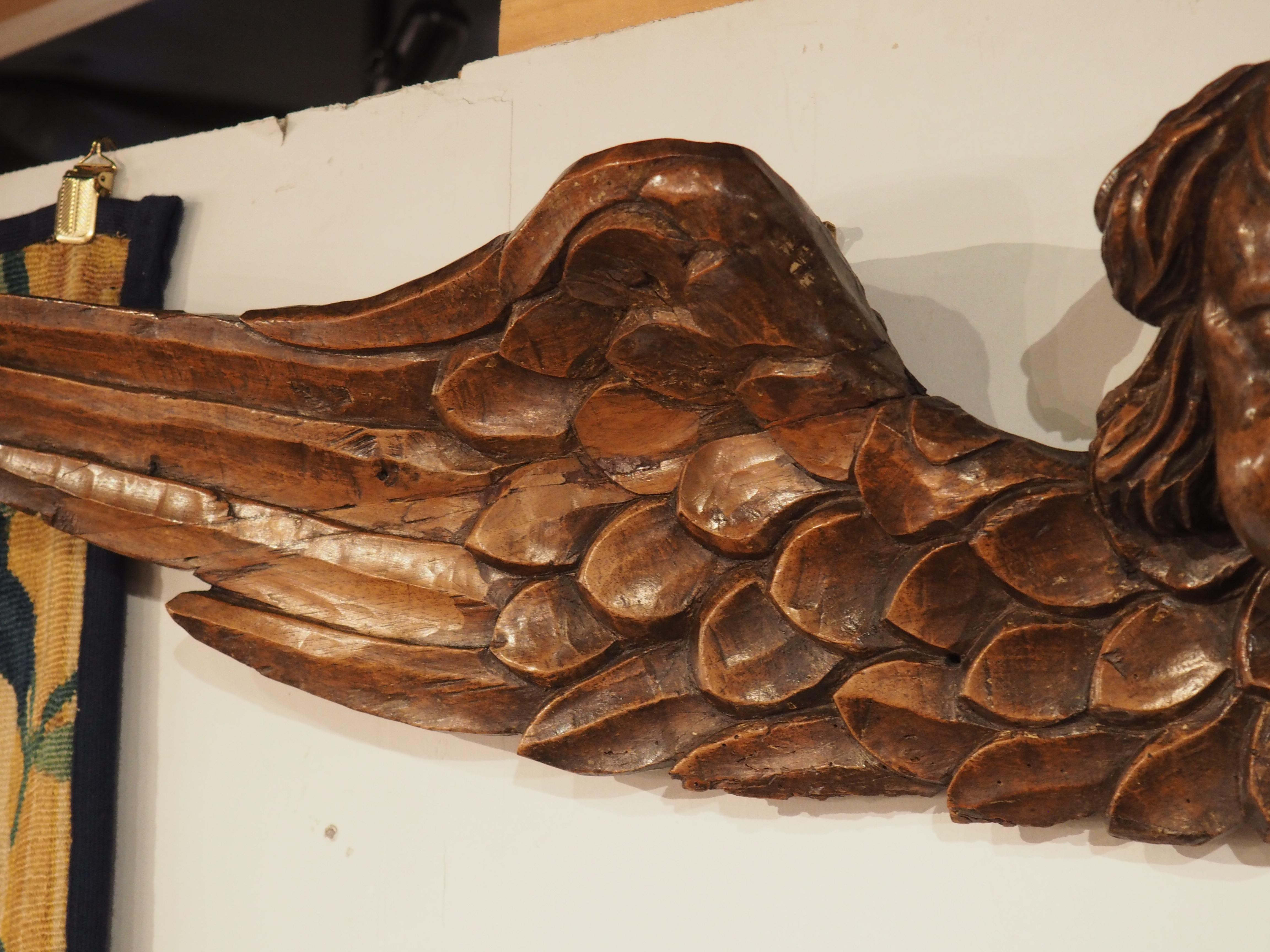 A Wide 17th Century Winged Angel in Carved Walnut Wood from France For Sale 3