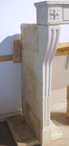 A Wide 18th Century French Louis XVI Carved Limestone Fireplace Mantel, L~80 in.