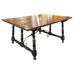 Antique A Wide, C. 1750 Spanish Walnut Table with Turned Legs and Wrought Iron Stretcher