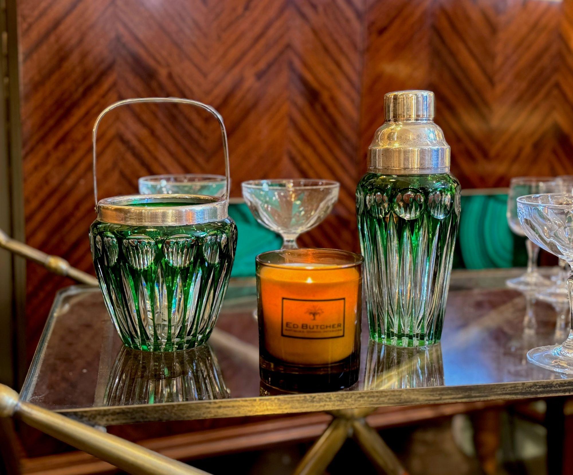 A wonderful Wilhelm Wolff 1940s crystal and silver plated cocktail shaker and ice bucket in stunning green colour with silver plated top, rim and handle.