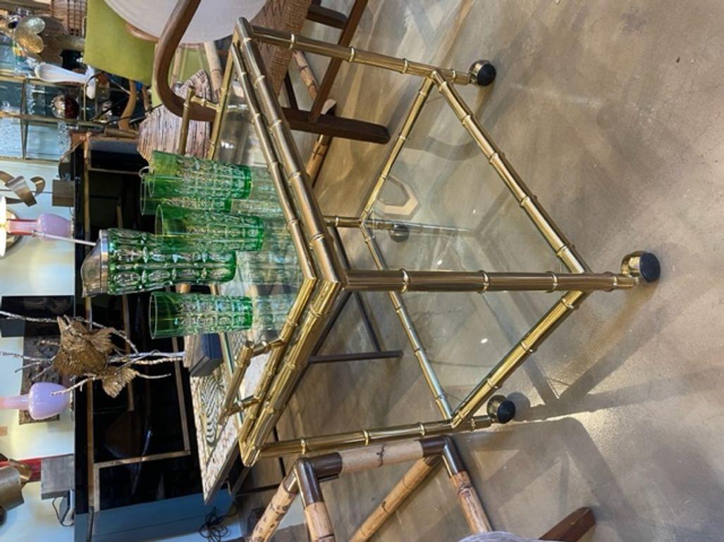 A wonderful Wilhelm Wolff 1940s crystal and silver plated cocktail jug in stunning green colour with silver plated pouring spout and ice sieve top, with four matching cut glasses and Alpacca silver muddling spoon.