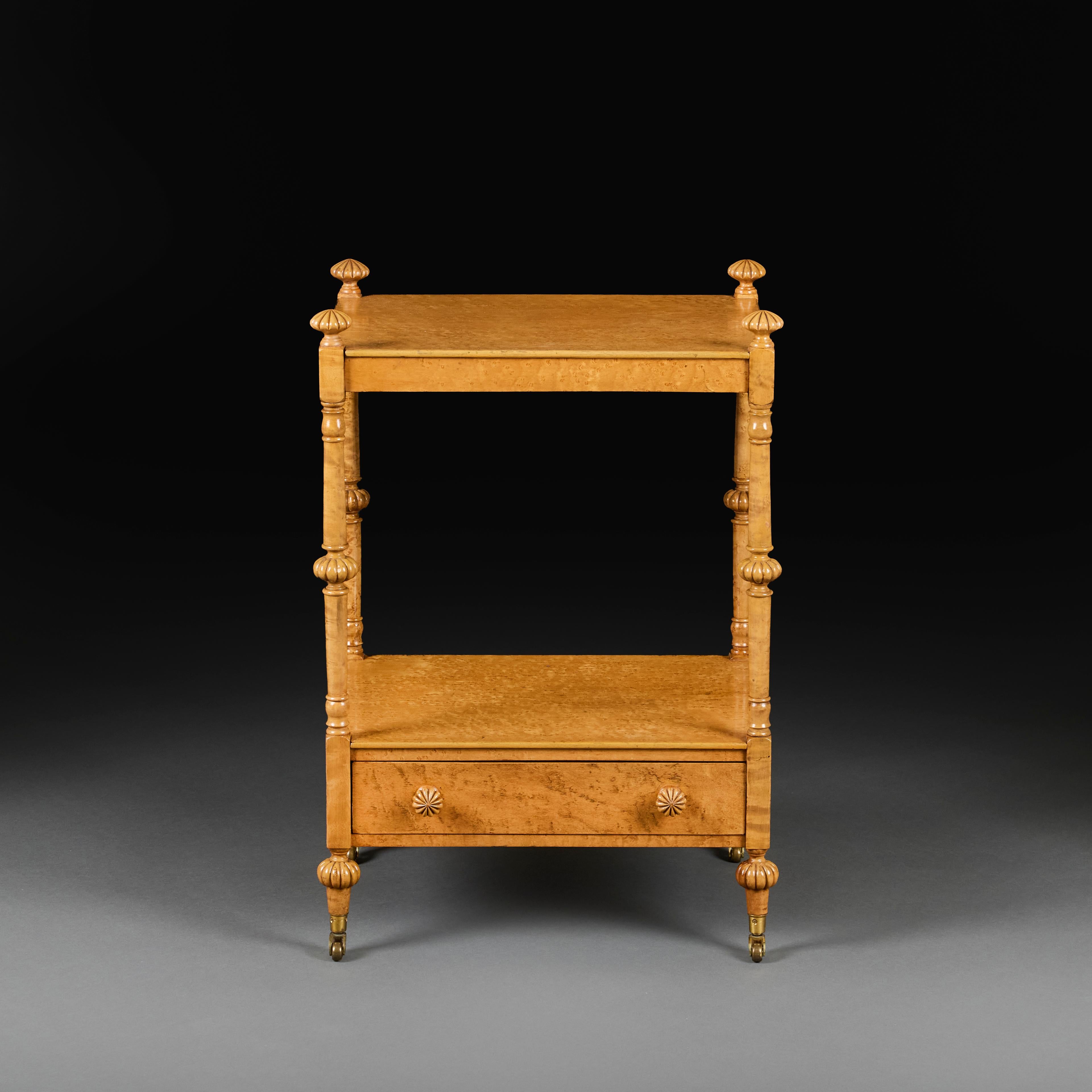 England, circa 1840

A fine early nineteenth century birds eye maple bedside table of excellent colour, with stylised finials and single drawer to frieze, all supported on brass castors.

Height   66.00cm
Width    46.00cm
Depth    37.00cm