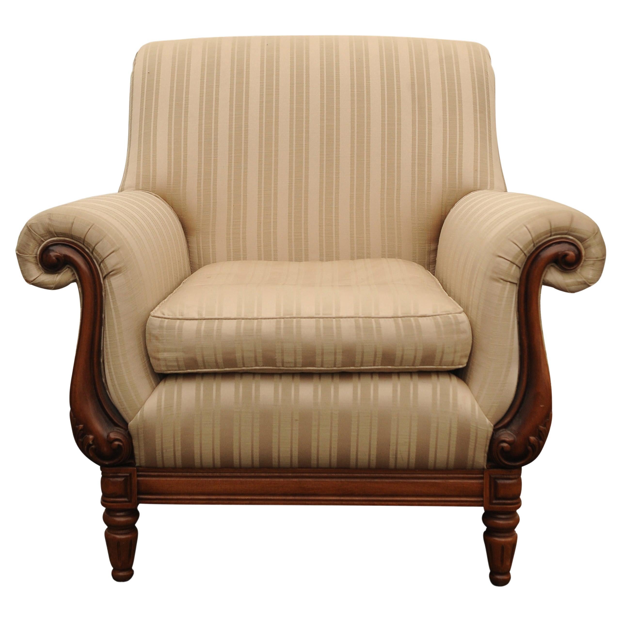 A Classic William IV Empire Design Library Armchairs Striped Cream Upholstery Ideal For Any Library or Lounge Environment.
The striped upholstered backs above a loose cushioned seat between bateau forming scroll arms, raised on turned and fluted