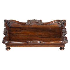 A William IV rosewood desk tidy attributed to Gillows