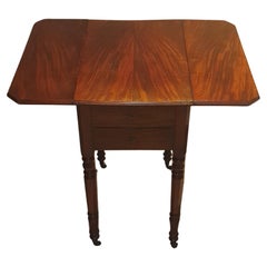 A William IV Mahogany drop leaf small side table with two drawers and side hatch