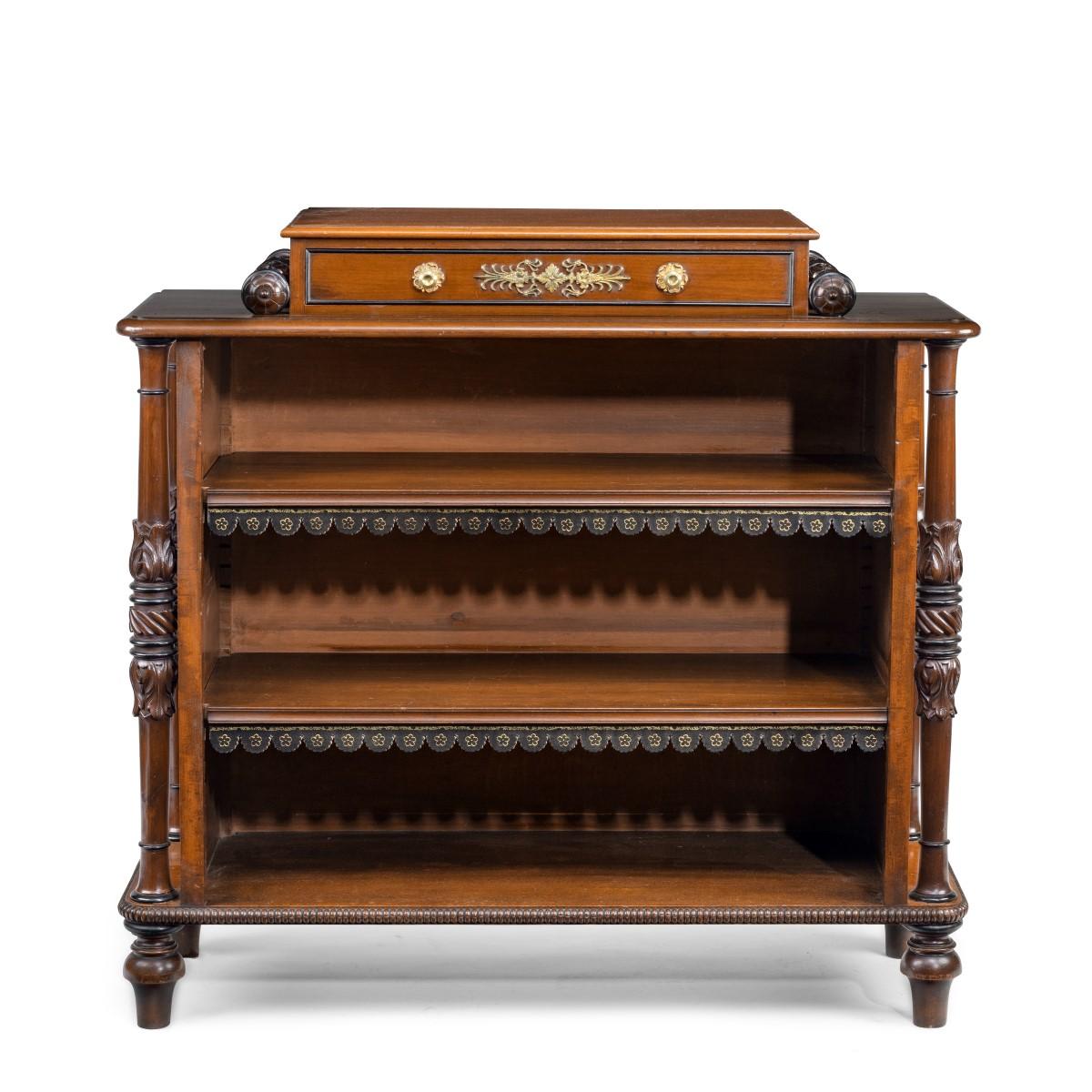 A William IV mahogany open bookcase by Brown and Lamont, of rectangular form, the top surmounted by a small plinth enclosing a drawer flanked by two turned rails with central tied acanthus bands, all above two adjustable shelves with similar turned