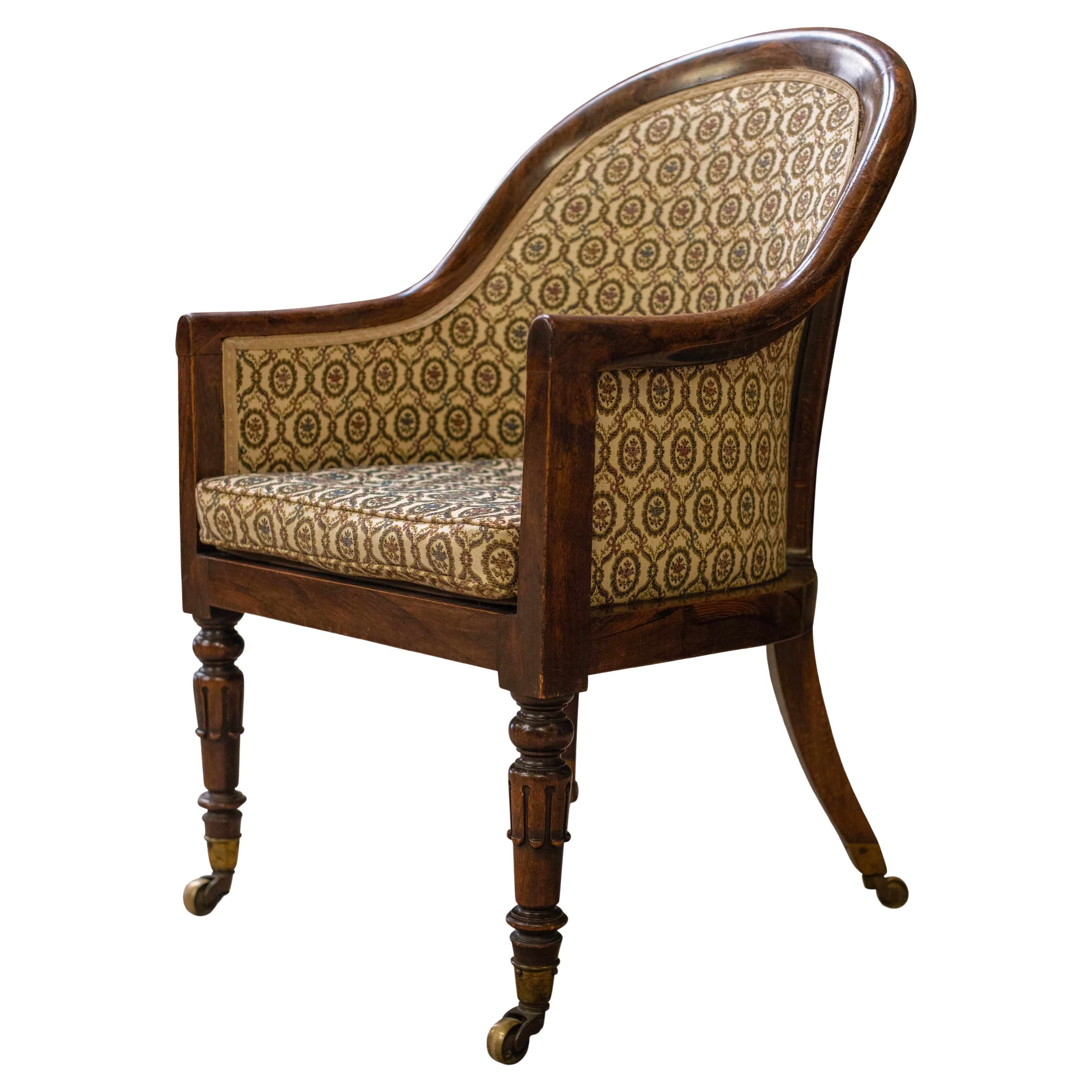 A William IV Mahogany Tub Chair, On Petal Carved And Ring Turned Supports And Finished With Brass Caps And Castors.

Would suite a period style or modern library, or living room setting. 

Additional dimensions 

Width of seat 47cm
Depth of