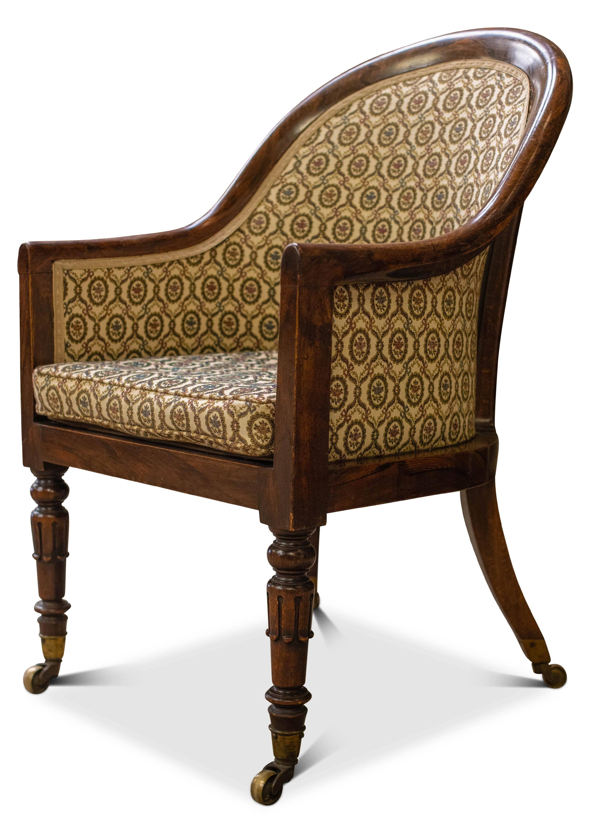Hand-Carved William IV Mahogany Tub Chair, on Ring Turned Supports with Original Castors