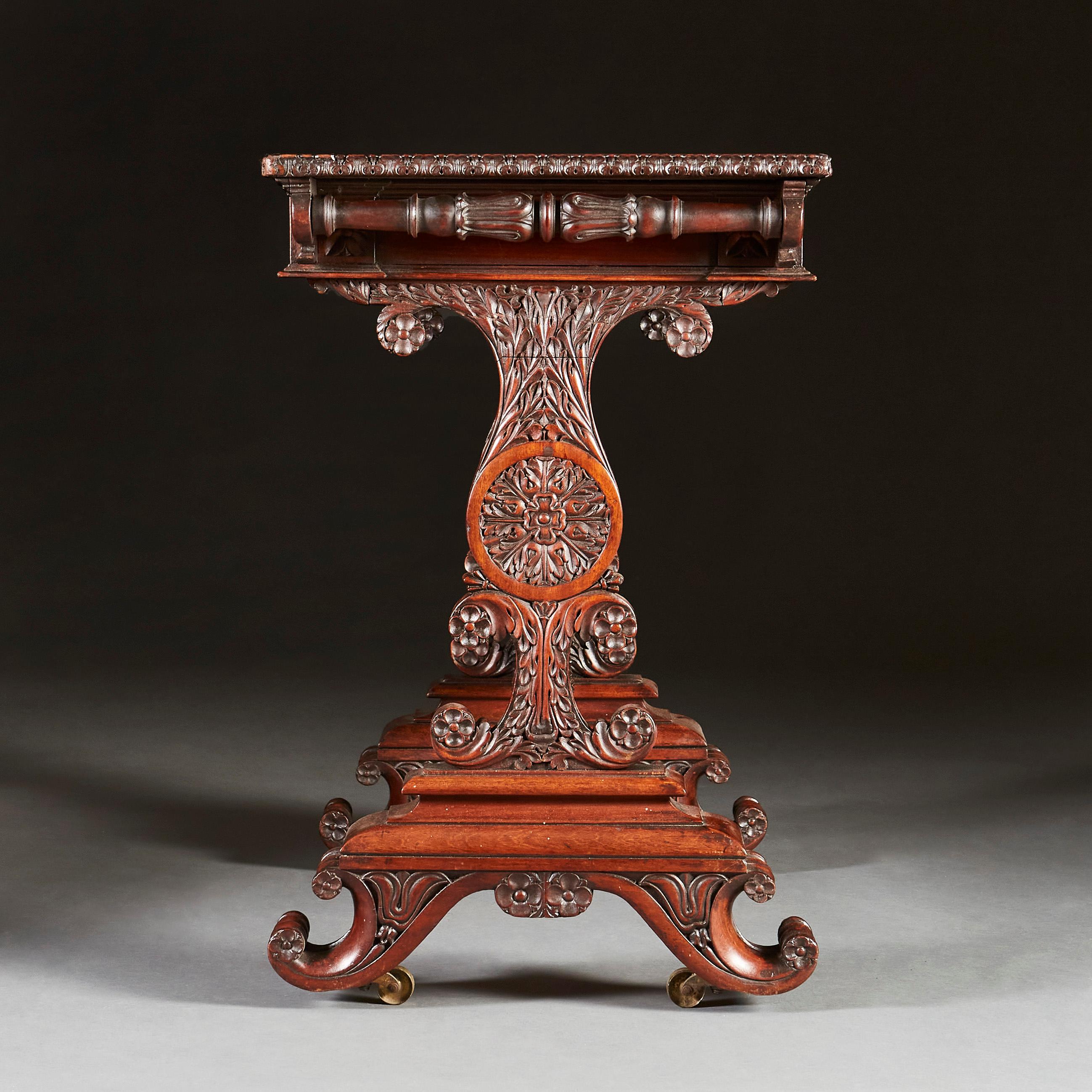 A fine William IV mahogany writing table, with deeply carved uprights with foliate designs, and carved Greek lyre stretcher and double scroll foot with brass castors, with green leather top and a single drawer to the frieze.