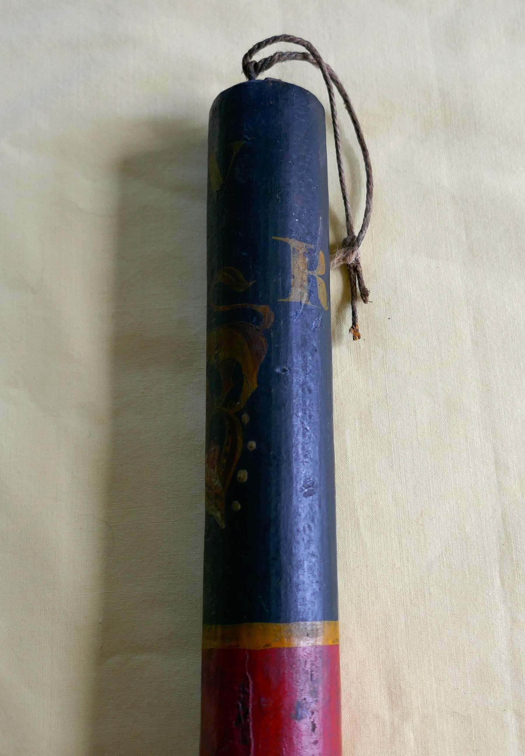 A William IV policeman’s truncheon.

A great piece of social history, the baton has a slightly shaped grip handle, the lower part is painted in Red and the upper part has a blue background with the lion crested crown cypher for WR IV.

A good
