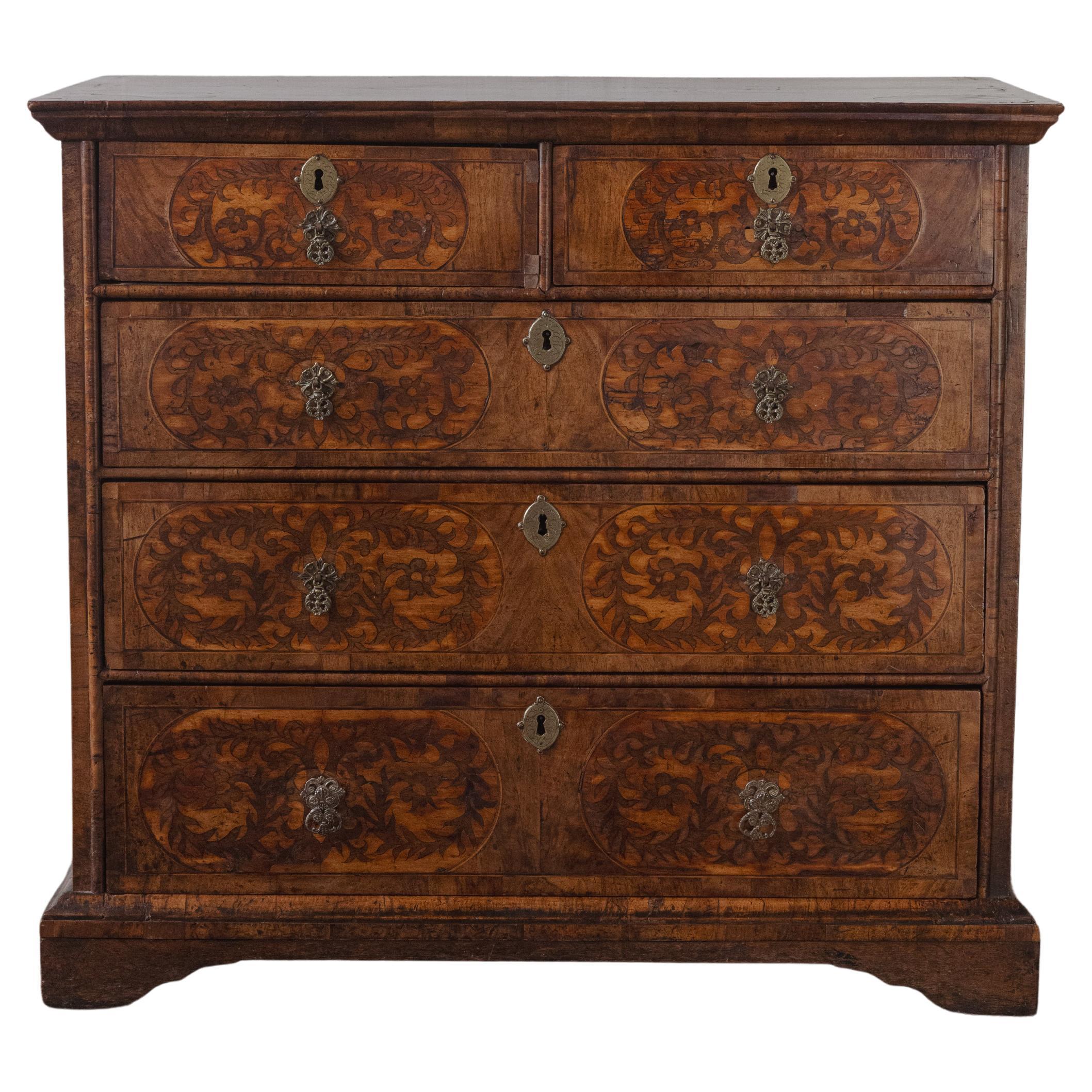 A William & Mary walnut seaweed marquetry Chest of Drawers