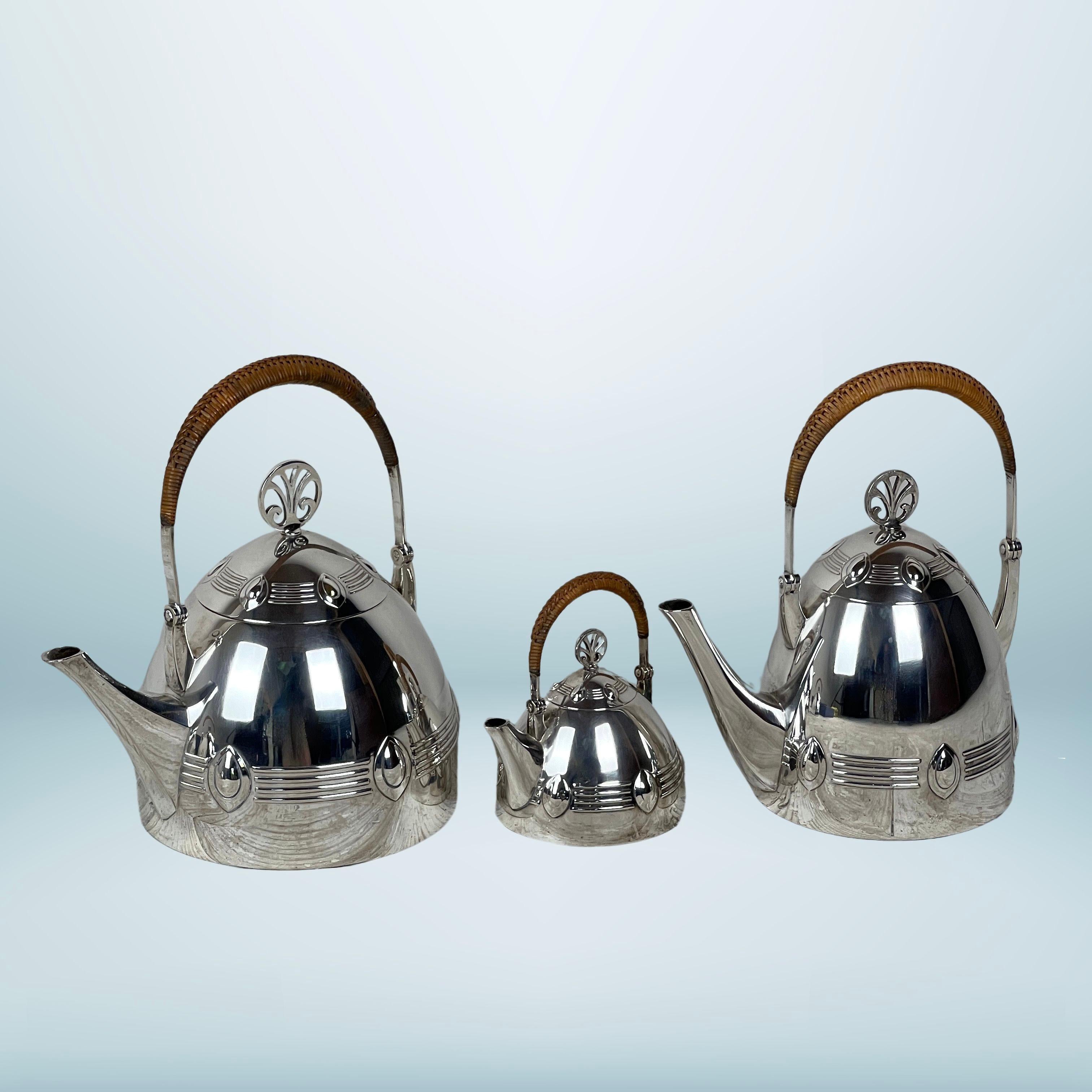 A beautiful and elegant WMF silver plate tea and coffee set, circa 1906, in the Jugendstil style. The set comprises a tea pot, coffee pot, milk jug, and sugar bowl, and is documented in the 1906 WMF catalogue.

Reflecting the classic characteristics