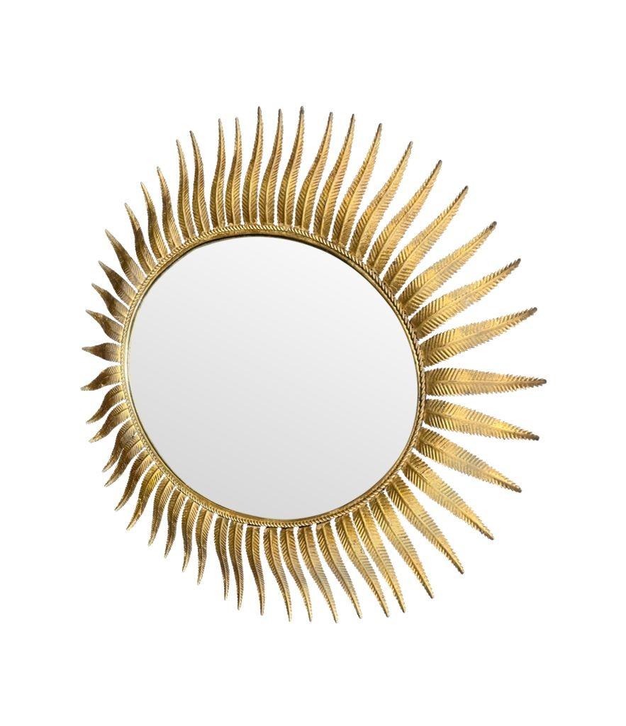 A wonderful 1950s gilt metal oval Spanish sunburst, eyelash mirror For Sale 5