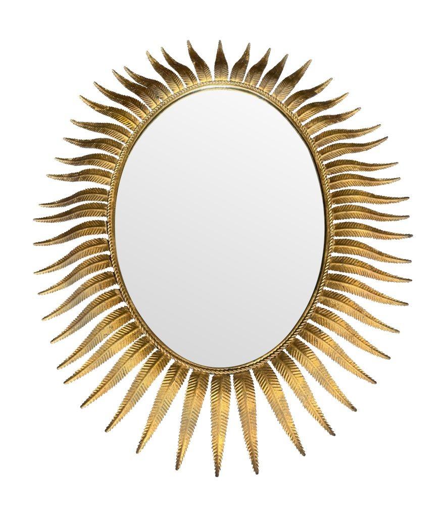 A wonderful 1950s gilt metal oval Spanish sunburst, eyelash mirror For Sale 6