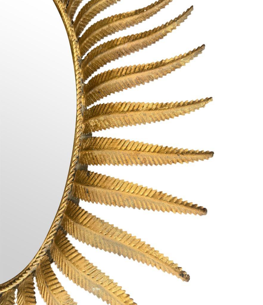 A wonderful 1950s gilt metal oval Spanish sunburst, eyelash mirror For Sale 7