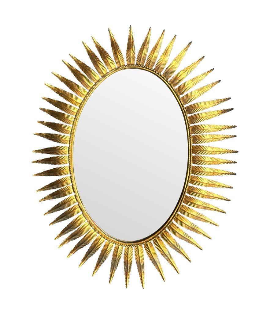 A wonderful 1950s gilt metal oval Spanish sunburst, eyelash mirror For Sale 2