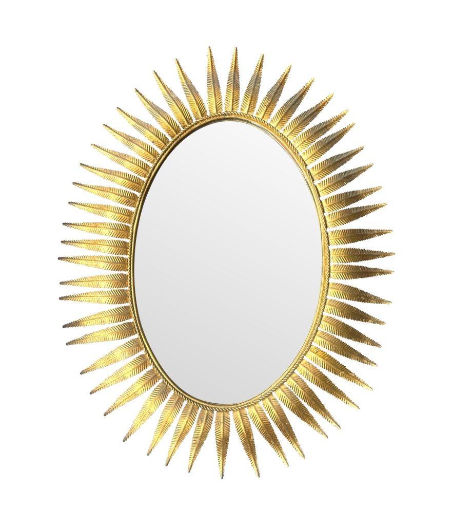A wonderful 1950s gilt metal oval Spanish sunburst, eyelash mirror For Sale 4