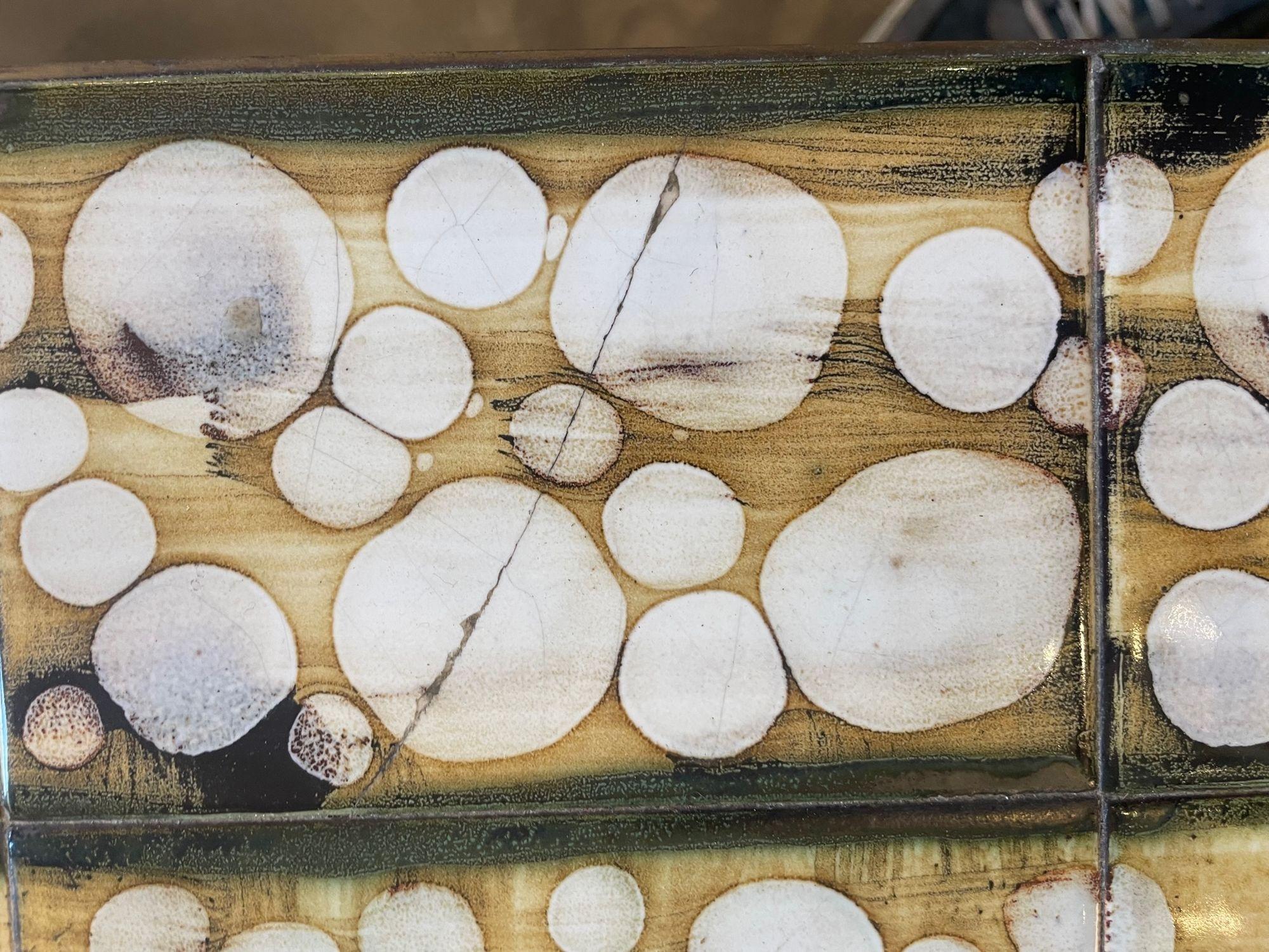 A wonderful 1960s ceramic tiled table by Dennis Townsend for Heals London 12