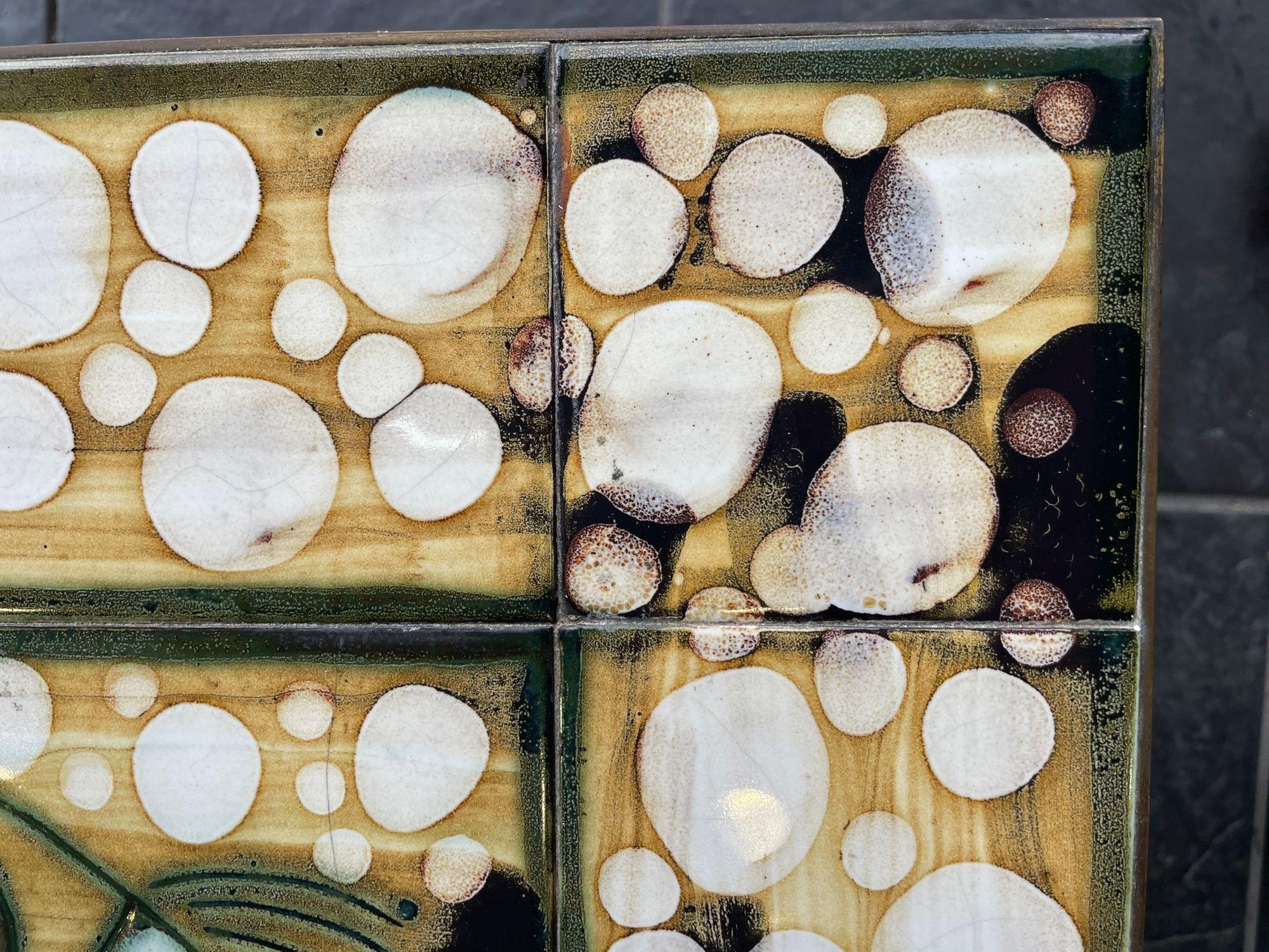 A wonderful 1960s ceramic tiled table by Dennis Townsend for Heals London 1