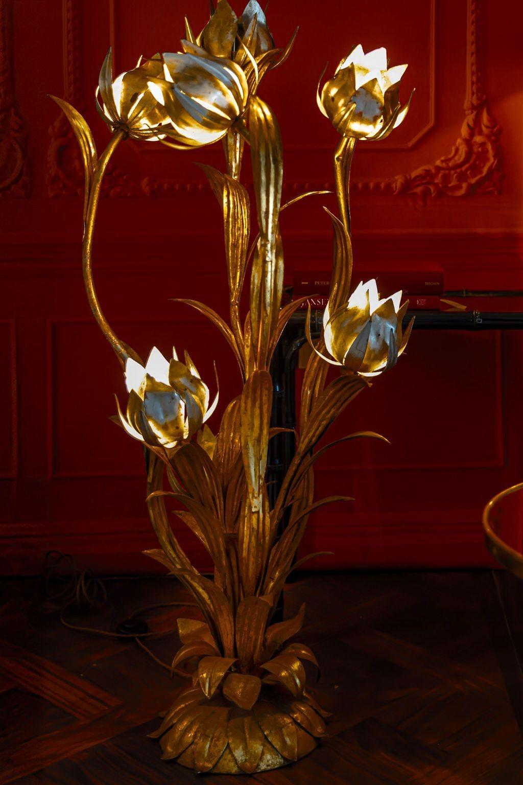 A large 1960s Italian gilt metal flower lamp with seven lights in the silvered flowers in the style of Hans Kogl. Re wired with new brass fittings, antique gold cord flex and foot switch.