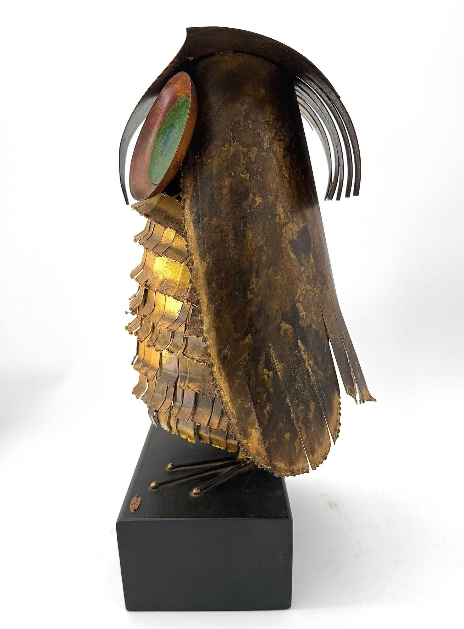 A wonderful 1966 torch cut brass Curtis Jere owl, with green enamelled eyes. 6