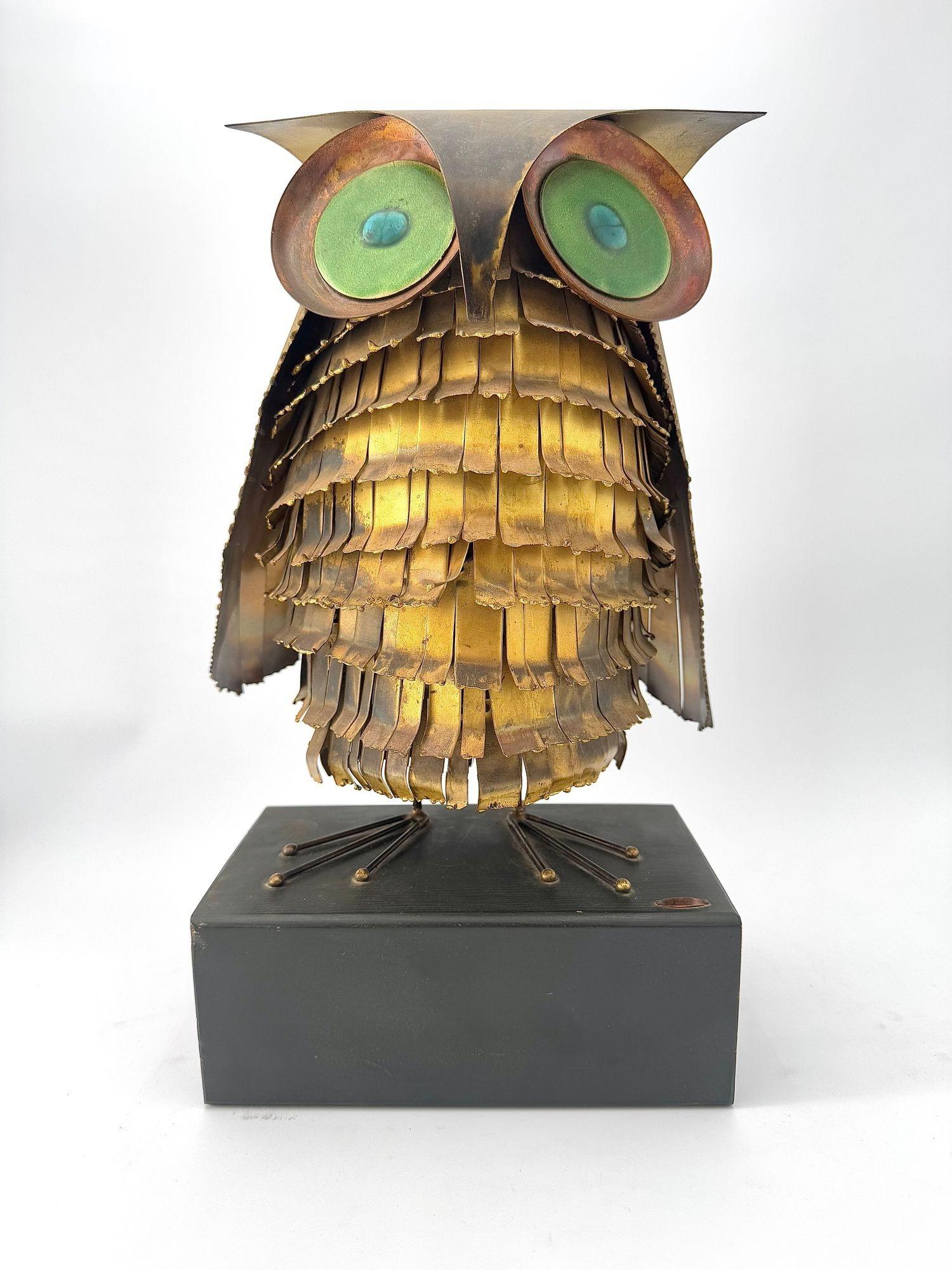 A wonderful 1966 torch cut brass Curtis Jere owl, with green enamelled eyes. 7