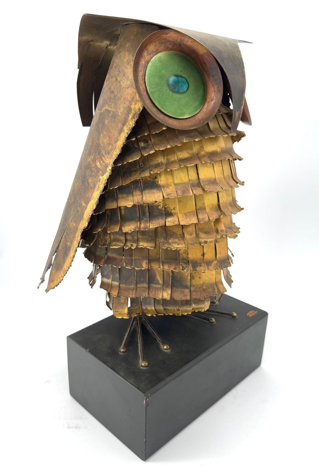 Mid-20th Century A wonderful 1966 torch cut brass Curtis Jere owl, with green enamelled eyes.