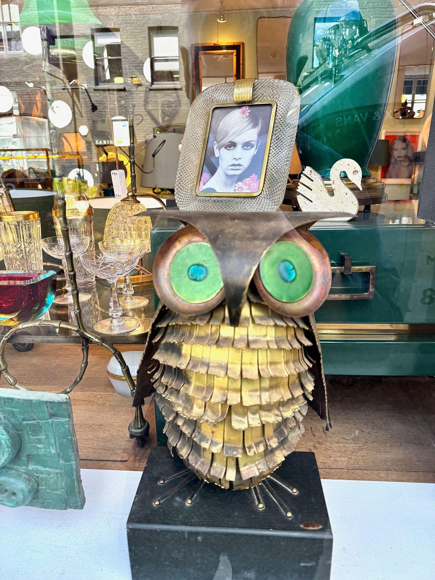A wonderful 1966 torch cut brass Curtis Jere owl, with green enamelled eyes. 1